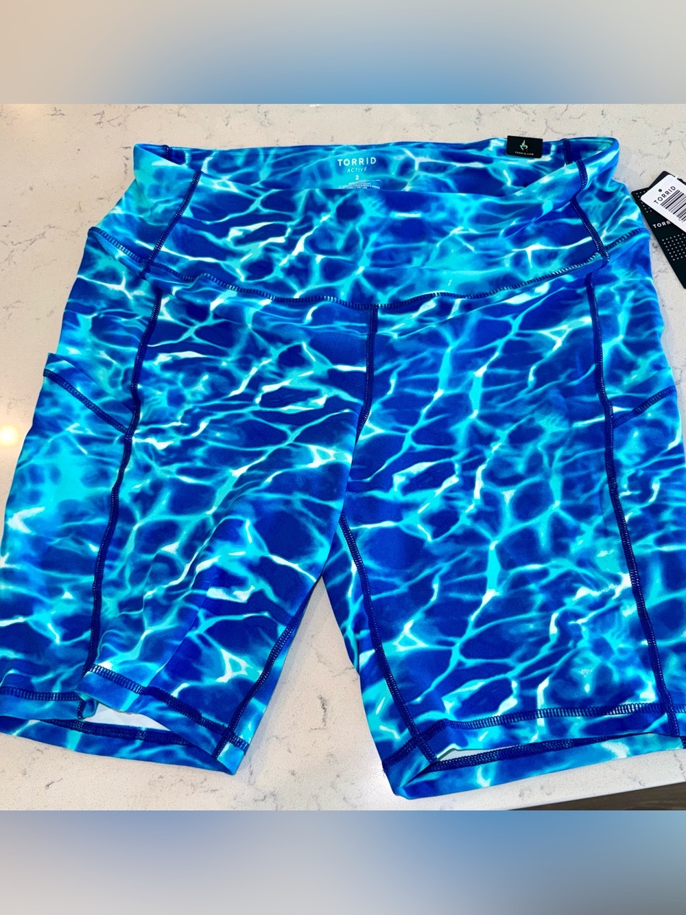 Torrid Blue Water-Effect Athletic Bike Shorts
Pool pattern - Rare